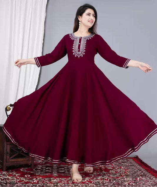 Women Solid Flared Kurta  (Maroon)